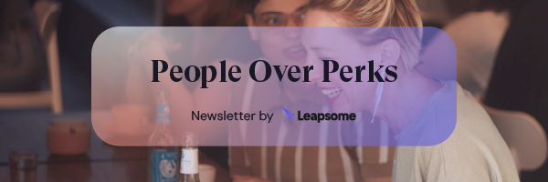 Header image of the People Over Perks newsletter by Leapsome, showing two people smiling in a conversation